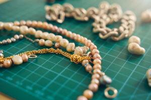 Close up of handmade vintage jewelry on the workplace